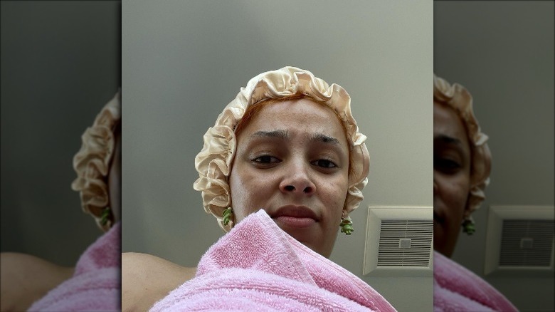 Doja Cat posing in a make-up free selfie