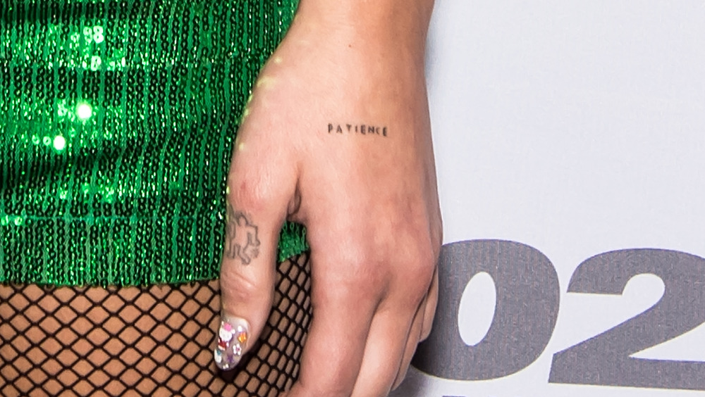 Dua Lipa's patience tattoo