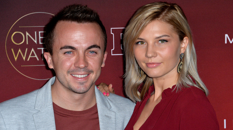 Frankie Muniz and wife Paige Price posing