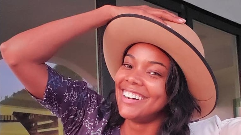 Gabrielle Union smiles alongside her baby