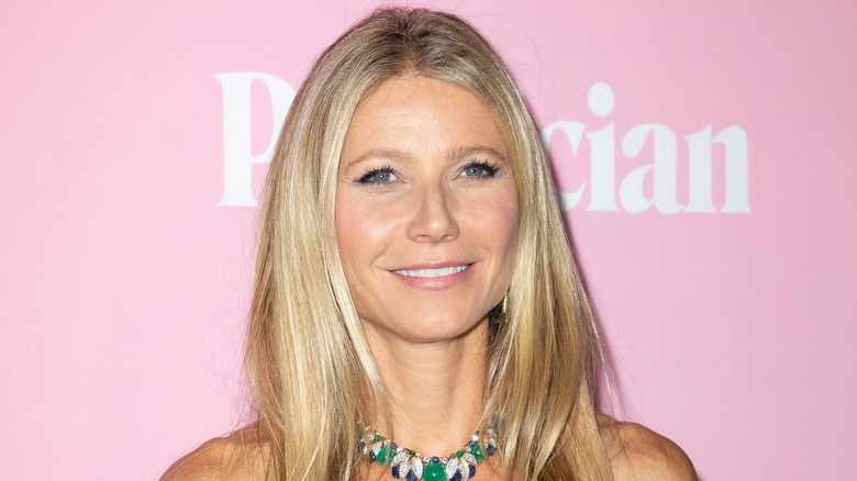 Smiling Gwyneth Paltrow posing at a red carpet event