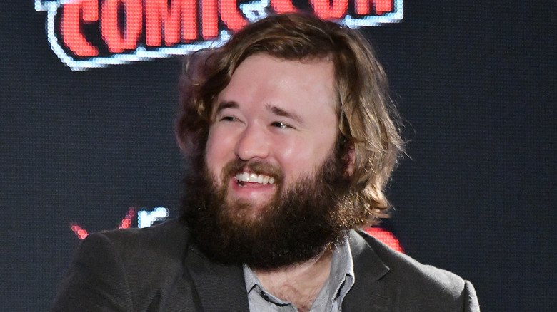 Haley Joel Osment laughing onstage