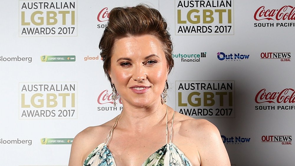 Lucy Lawless smiling at an awards show in 2017