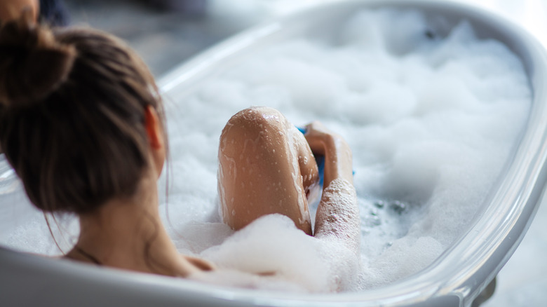 woman taking bath