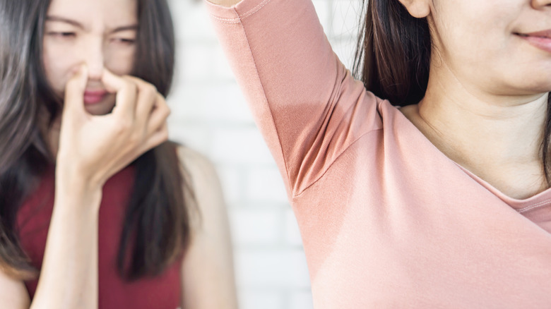 two women, one with body odor