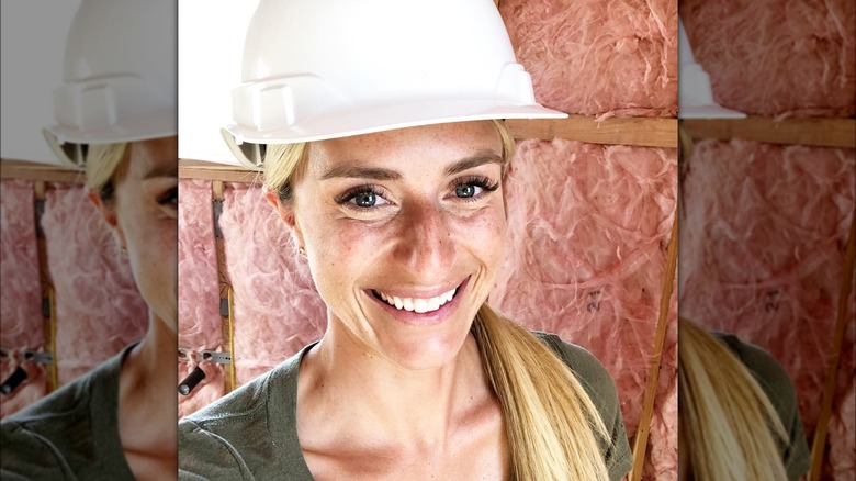 Jasmine Roth smiling while wearing a hardhat