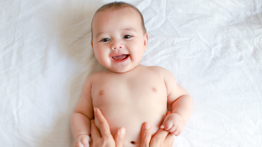 Newborn baby smiling