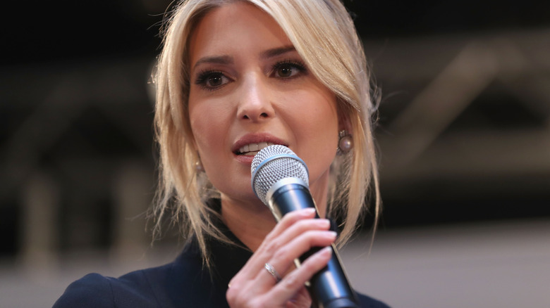 Ivanka Trump speaking onstage into a microphone