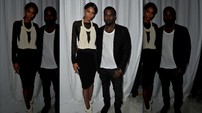 Chanel Iman and Kanye smirking