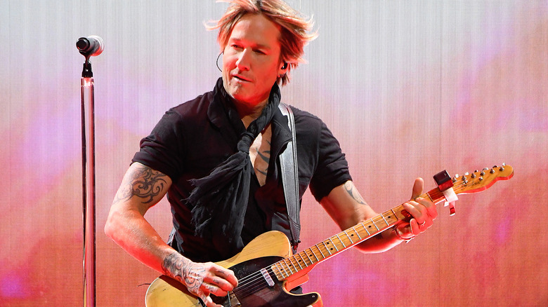 Keith Urbans 7 Tattoos  Their Meanings  Body Art Guru  Keith urban  tattoo Urban tattoos Keith urban