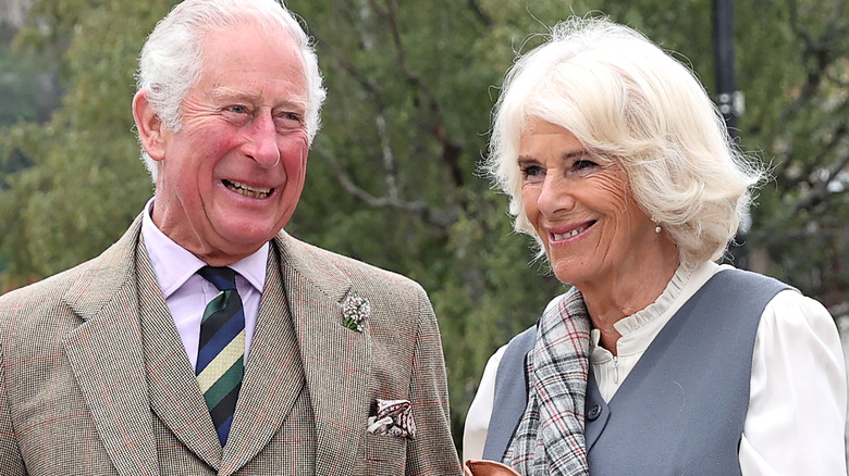 Charles and Camilla laugh