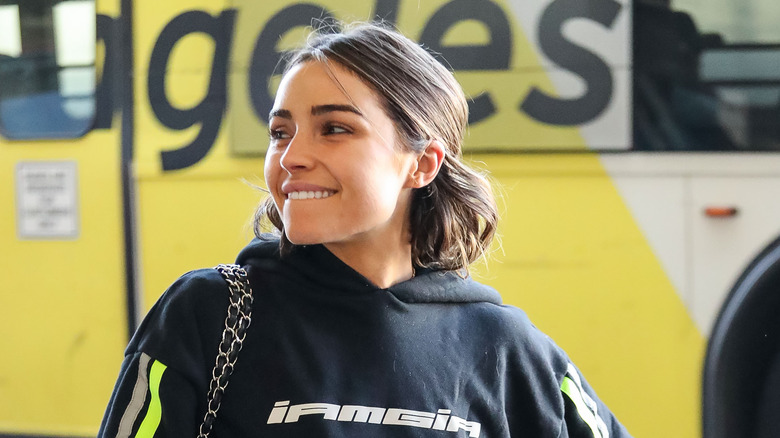 Olivia Culpo makeup-free at the airport