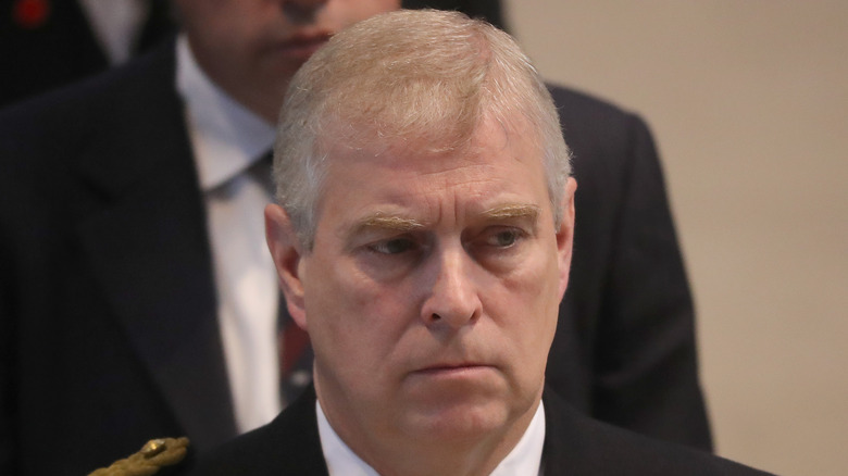 Prince Andrew looks grumpy