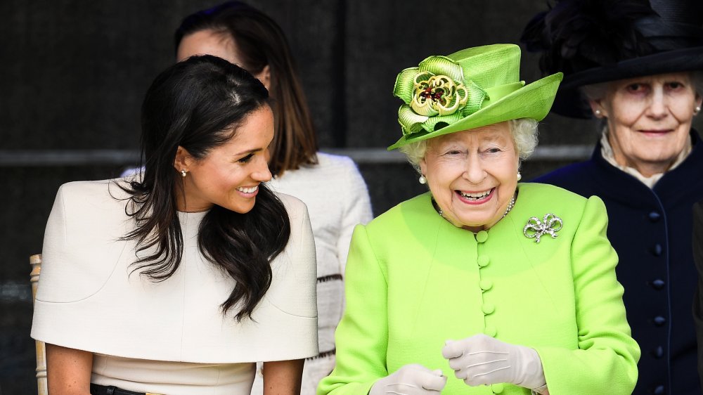 Queen Elizabeth II and Meghan Markle talking