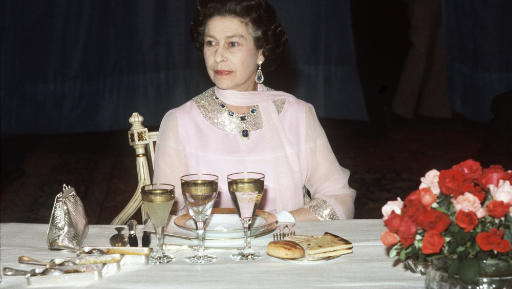 Queen Elizabeth eating