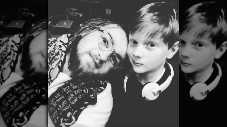 Angus T. Jones taking a selfie with his brother