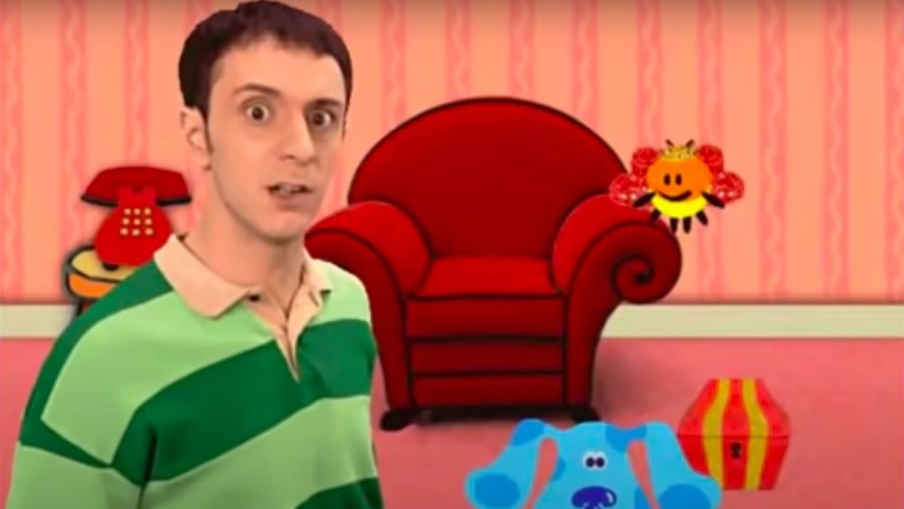 Steve Burns in a red room with Blue on Blue's Clues