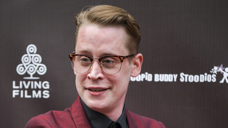 Macaulay Culkin smiling