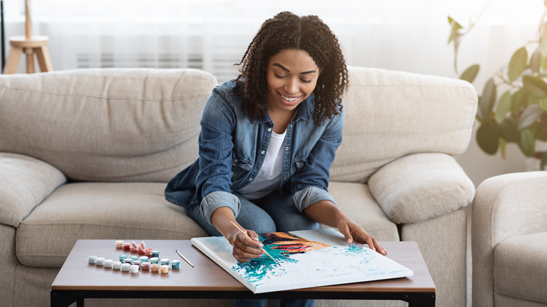 Woman on sofa painting picture