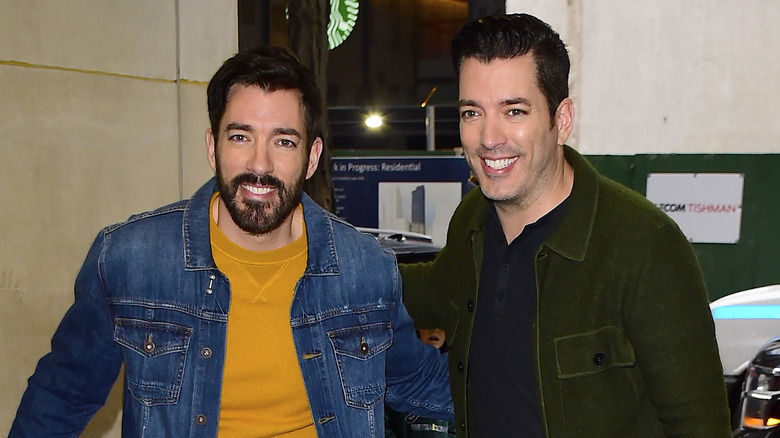 Drew and Jonathan Scott smiling