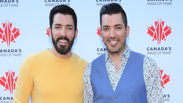 Drew and Jonathan Scott smiling