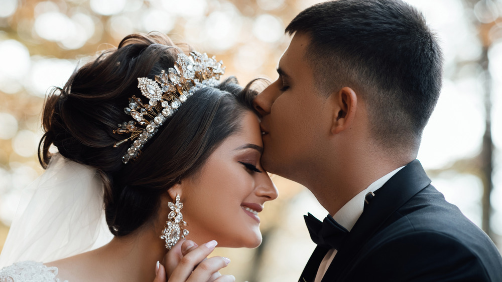 Wedding Couple Kisses