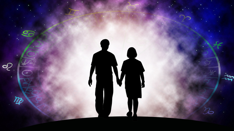 Couple walking through birth chart