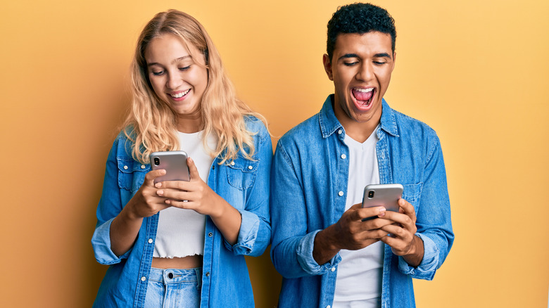 Couple texting on their phones