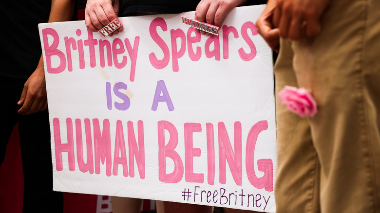 Protestor holding a #FreeBritney sign