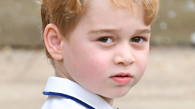 Prince George looking on