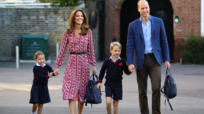 George with his parents and sister 