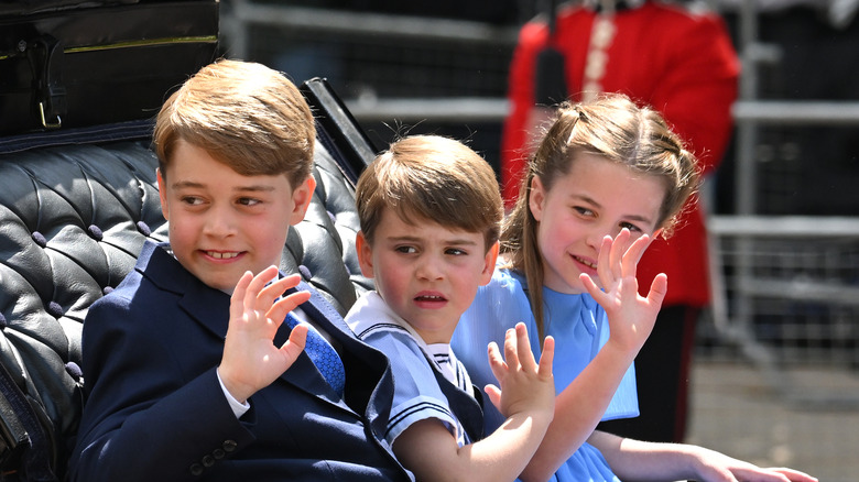 Prince George and his siblings waving 