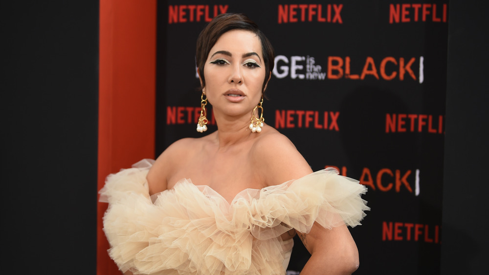 Jackie Cruz poses at Netflix event