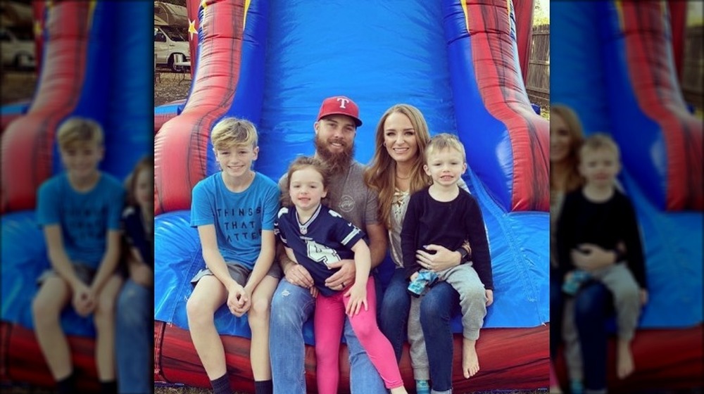 Teen Mom OG's Maci Bookout poses with her husband and kids