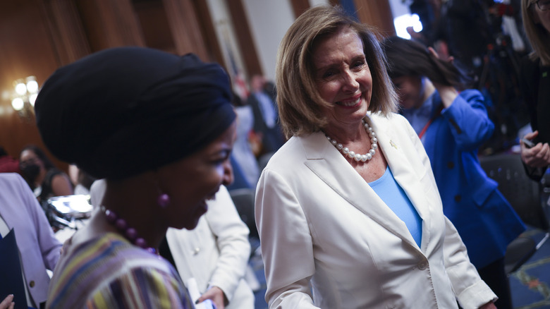 Nancy Pelosi and Ilhan Omar following the vote