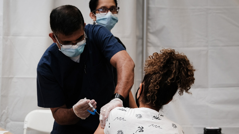 Woman getting vaccinated 