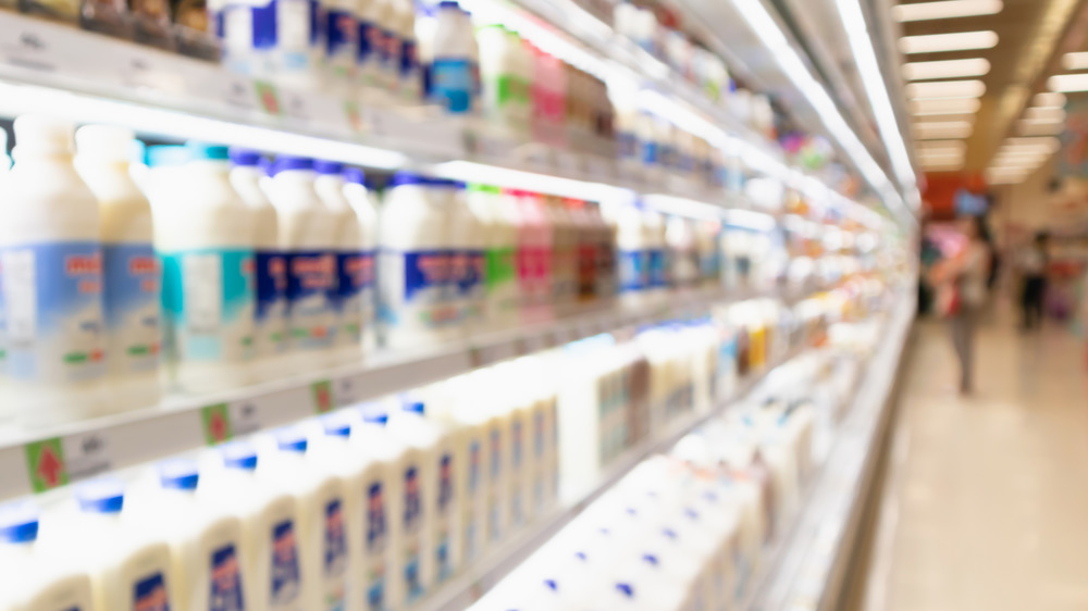 A long row of drink options in a grocery aisle 