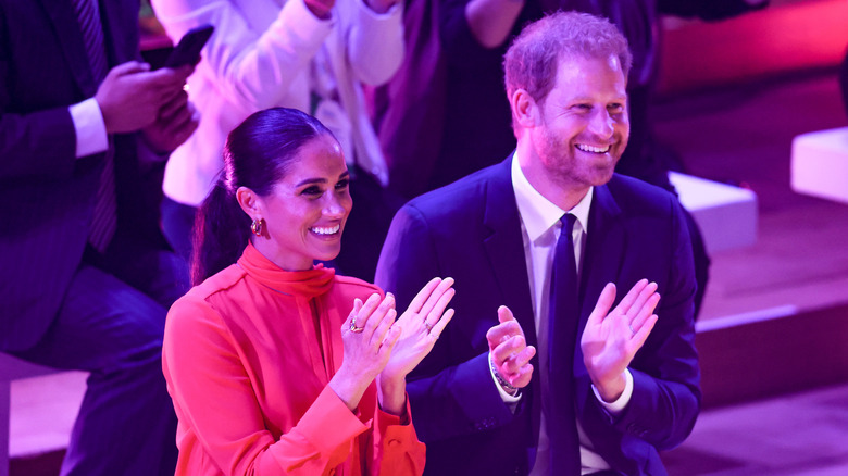 Meghan Markle and Prince Harry clapping