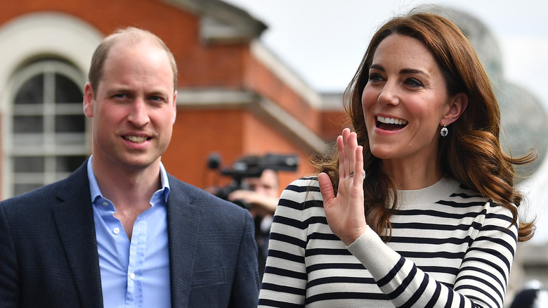 Prince William and Kate Middleton interact with the public. 