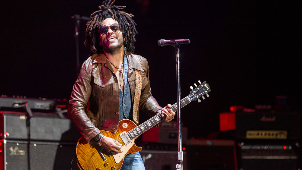 Lenny Kravitz playing guitar