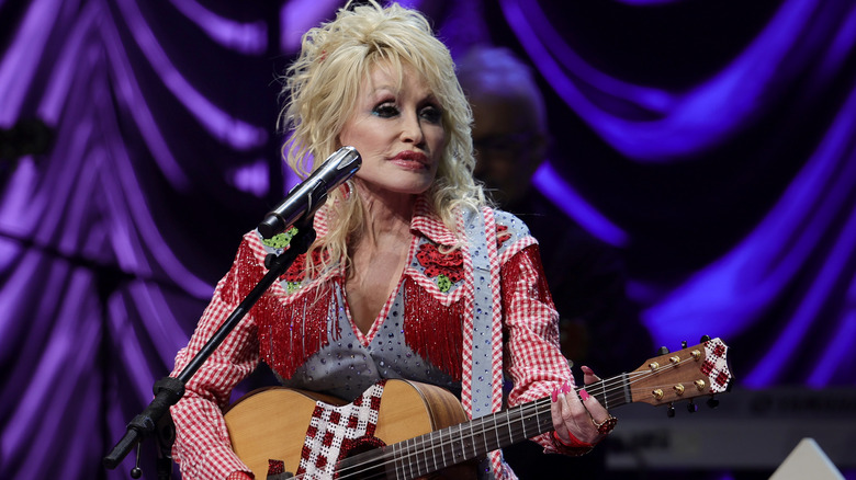 Dolly Parton performs at an event