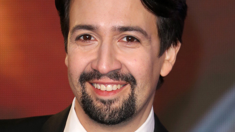 Lin-Manuel Miranda smiles in a tux