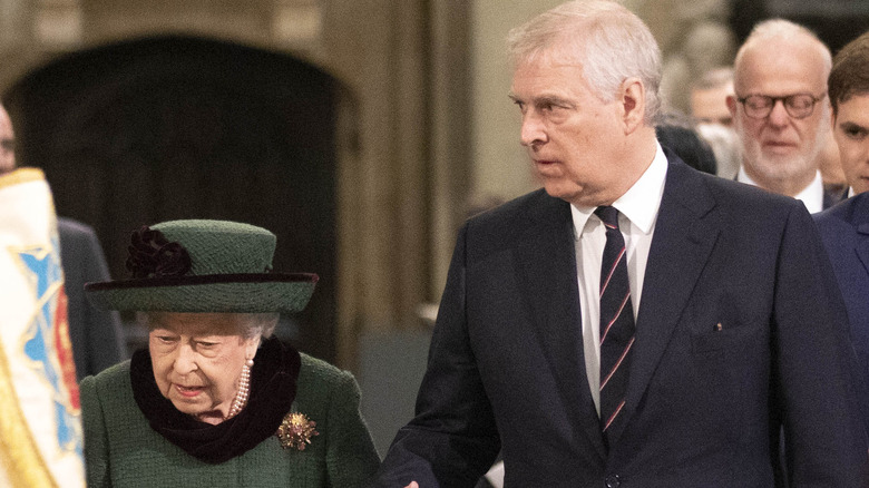 Queen Elizabeth with Prince Andrew escorting her