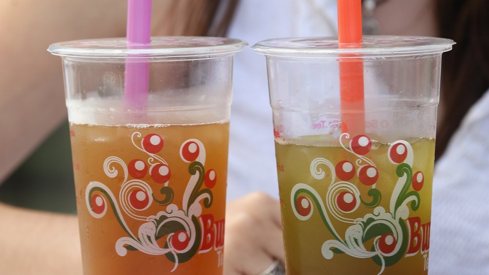 Two cups of fruit-flavored bubble tea