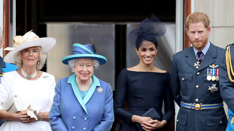 Royal Family standing together and smiling