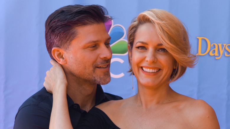 Arianne Zucker and Greg Vaughan posing together