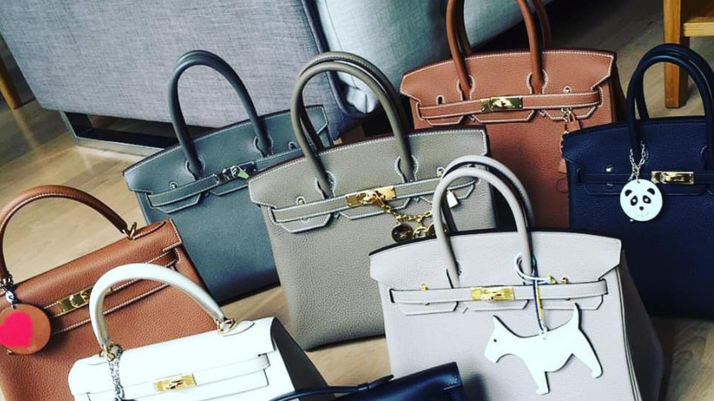 Birkin bags outfitted with different keychains 