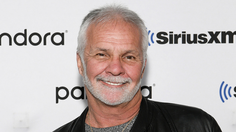 Below Deck's Captain Lee Rosbach smiling at SiriusXM