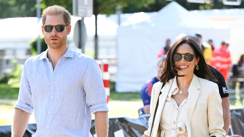 Prince Harry and Meghan Markle walking