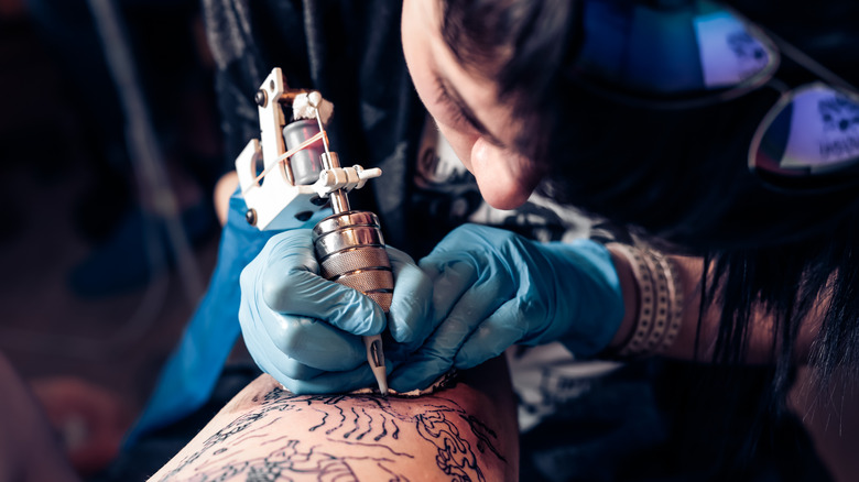 Person getting tattooed